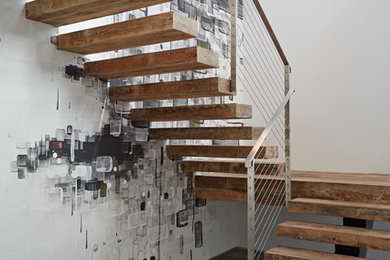 Example of a trendy floating staircase design in Los Angeles