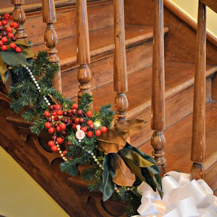 Staircase - small victorian wooden u-shaped wood railing staircase idea in Other with wooden risers