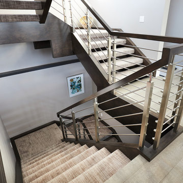 Maple stairs with carpeted treads and stainless steel railing