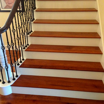 Maple wood stair install with white faces