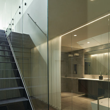 Master bathroom through stair core