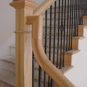 Metal baluster stair with goose-neck rail
