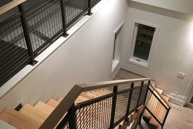 Staircase - industrial staircase idea in New York