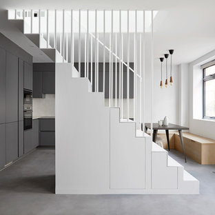 Photo of a contemporary straight metal railing staircase in London.