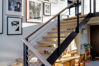 Imagen de escalera en L vintage de tamaño medio sin contrahuella con escalones de madera
