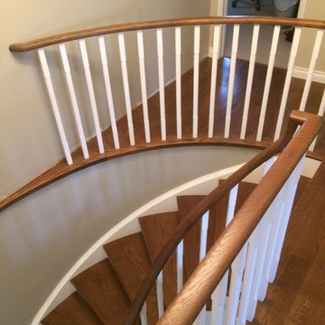 Mississauga hardwood stairs reno with square white spindles- showing upper hardw