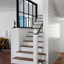 Farmhouse Staircase by Cuppett Kilpatrick Architecture + Interior Design