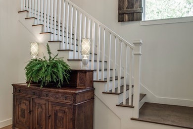 Staircase - farmhouse wooden l-shaped staircase idea in Dallas with painted risers