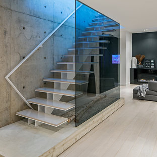 Inspiration for a scandinavian open staircase remodel in Toronto