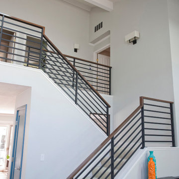 Modern house remodel: open staircase with horizontal railing