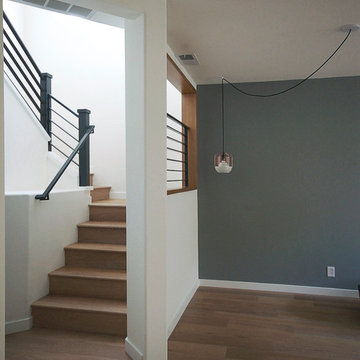 modern oak stair with metal railing