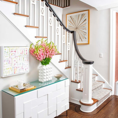 Mid-sized transitional carpeted l-shaped wood railing staircase photo in New York with carpeted risers