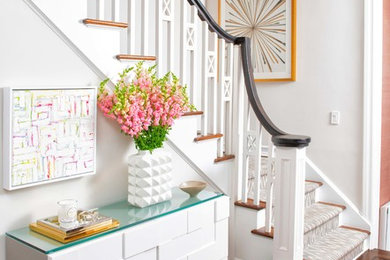 Mid-sized transitional carpeted l-shaped wood railing staircase photo in New York with carpeted risers