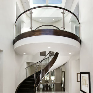 Trendy curved staircase photo in San Francisco