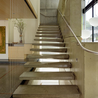 Staircase - modern concrete floating open and metal railing staircase idea in San Francisco