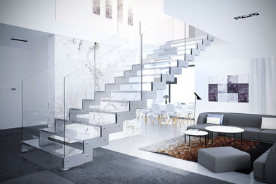 Diseño de escalera suspendida actual grande sin contrahuella con escalones de vidrio y barandilla de vidrio