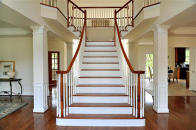 Staircase - mid-sized traditional wooden straight staircase idea in Philadelphia with painted risers