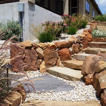 Multi-Level Patio with Hot Tub Water Feature and Boulder Staircase