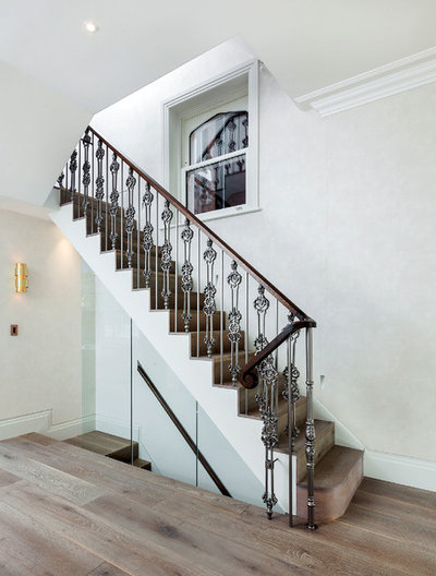 Traditional Staircase by Cheville Parquet