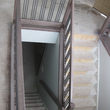 New Construction - Contemporary Maple Railings with Metal Spindles