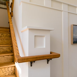 Inspiration for a mid-sized timeless wooden u-shaped wood railing staircase remodel in San Francisco with wooden risers