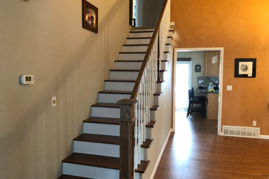 New staircase, railing and refinished hardwood floors