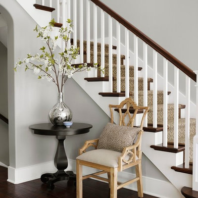 Staircase - traditional wooden l-shaped staircase idea in Chicago with painted risers