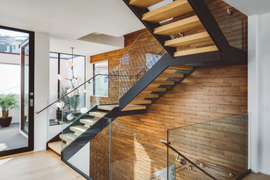 Staircase - contemporary wooden u-shaped open staircase idea in San Francisco