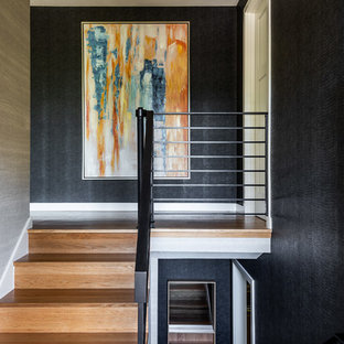 Inspiration for a 1960s wooden cable railing staircase remodel in Seattle with wooden risers