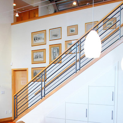 Inspiration for a mid-sized coastal straight mixed material railing staircase remodel in Seattle