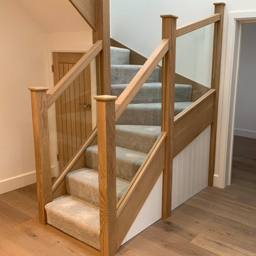 Oak & Glass Carpeted Winder Staircase