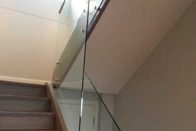 Oak stair and glass rail