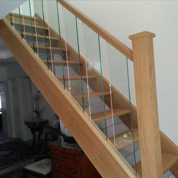 Oak staircase with glass spindles