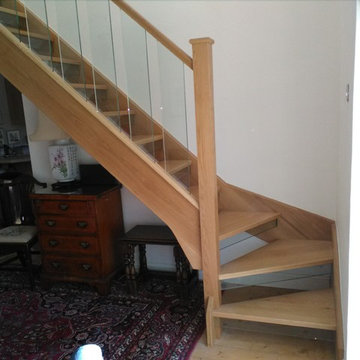 Oak staircase with glass spindles
