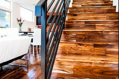 Staircase - mid-sized contemporary wooden straight metal railing staircase idea in Portland with wooden risers