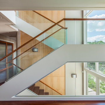 Open floating staircase— 2014 Lakeway Warm Contemporary Waterfront Custom Home o