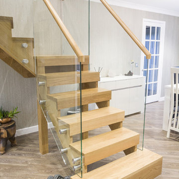 Open Riser Staircase with Structural Glass Balustrade