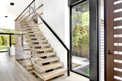 Example of a wooden straight staircase design in Chicago