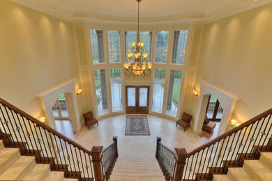 Staircase - large traditional carpeted straight staircase idea in Seattle with carpeted risers