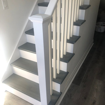 Painted and stained staircase.