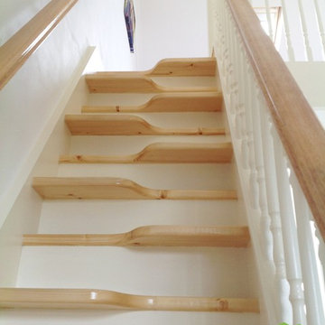 White painted SpaceSaver staircase with pine accents