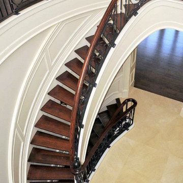 Paneled Stringer Curved Stair- Open Concept