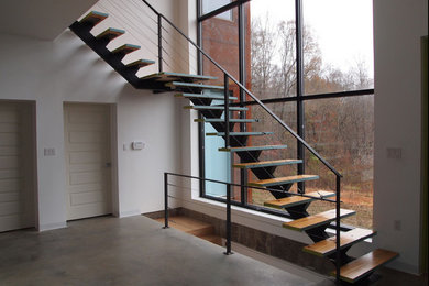 Staircase - rustic staircase idea in New York
