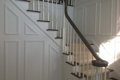 Staircase - traditional l-shaped staircase idea in New York