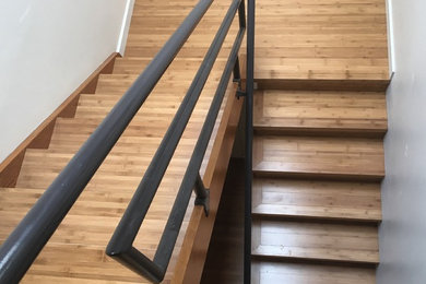 Staircase - contemporary staircase idea in Vancouver