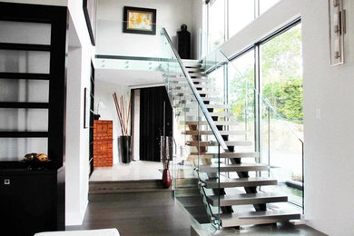 Concrete straight staircase in Vancouver with concrete risers.