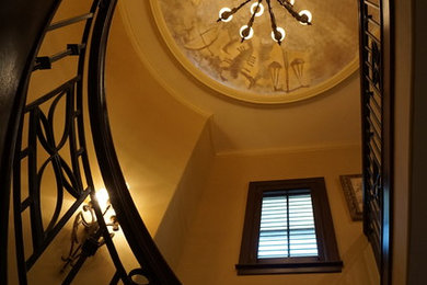 This is an example of an expansive mediterranean staircase in Houston.