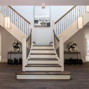 Inspiration for a medium sized traditional wood mixed railing staircase in Other with painted wood risers.