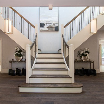 Staircase - mid-sized transitional wooden mixed material railing staircase idea in Other with painted risers