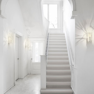 Pure white hall and staircase with lots of light